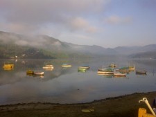 Sunrise over the Phewa Lake by Grant Rawlinson