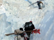 The Doctors taking ladders into the Khumbu Icefall