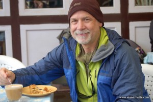 Alan enjoying apple pie in Namche in 2011