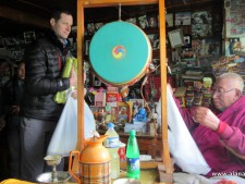 Garrett Madiosn with blessed prayer flags from Lama Geshi