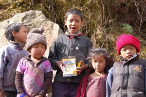 Passing out writing pens in the Khumbu.