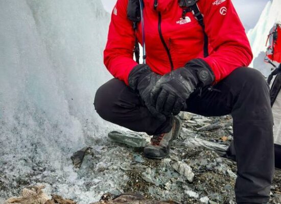 Photographer and filmmaker Jimmy Chin was leading a National Geographic team below the north face of Mount Everest in September when they discovered a boot and sock embroidered with “A.C. Irvine,” believed to belong to the lost mountaineer Andrew Comyn Irvine. PHOTOGRAPH BY NATIONAL GEOGRAPHIC/ERICH ROEPKE