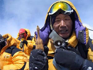 Rubber Chicken on Everest with Da'Ngima. Courtsey of ichael Franks and Project Himalaya - THANKS!!
